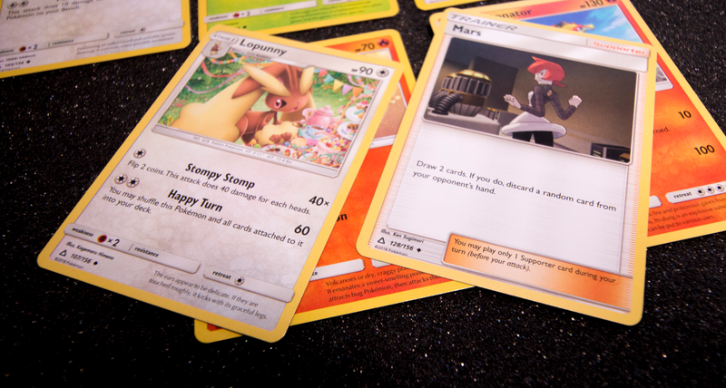 Illustration for article titled Let's Open Some Pokemon Ultra Prism Cards And See If There's Anything Good